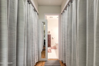 Located in the highly sought-after Sugar Mill Country Club on Sugar Mill Country Club in Florida - for sale on GolfHomes.com, golf home, golf lot