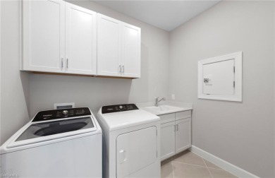 Welcome to this beautifully upgraded single-family home on River Hall Country Club in Florida - for sale on GolfHomes.com, golf home, golf lot