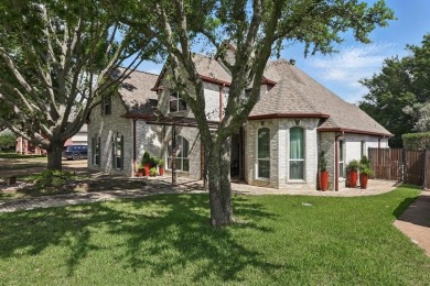 THIS ONE HAS IT ALL! Located on a quiet street in the Fox Pointe on Trophy Club of Dallas in Texas - for sale on GolfHomes.com, golf home, golf lot