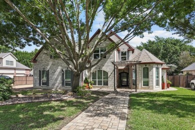 THIS ONE HAS IT ALL! Located on a quiet street in the Fox Pointe on Trophy Club of Dallas in Texas - for sale on GolfHomes.com, golf home, golf lot