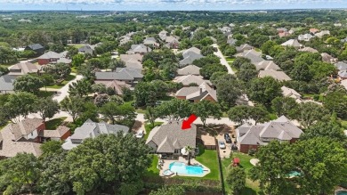 THIS ONE HAS IT ALL! Located on a quiet street in the Fox Pointe on Trophy Club of Dallas in Texas - for sale on GolfHomes.com, golf home, golf lot