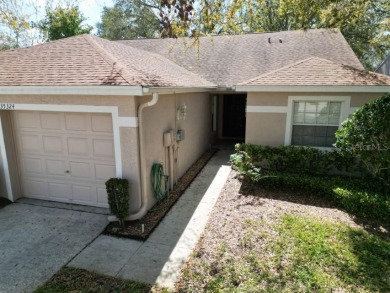 Welcome to this cozy 2-bedroom, 2-bathroom villa in the Lake on The Links of Lake Bernadette in Florida - for sale on GolfHomes.com, golf home, golf lot