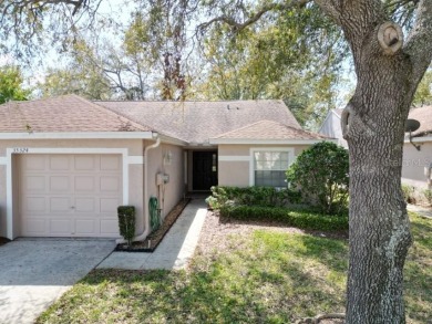 Welcome to this cozy 2-bedroom, 2-bathroom villa in the Lake on The Links of Lake Bernadette in Florida - for sale on GolfHomes.com, golf home, golf lot