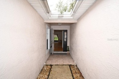 Welcome to this cozy 2-bedroom, 2-bathroom villa in the Lake on The Links of Lake Bernadette in Florida - for sale on GolfHomes.com, golf home, golf lot