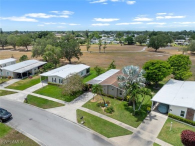 Enjoy living the Naples lifestyle in this light and bright well on Riviera Golf Club in Florida - for sale on GolfHomes.com, golf home, golf lot