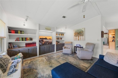 Enjoy living the Naples lifestyle in this light and bright well on Riviera Golf Club in Florida - for sale on GolfHomes.com, golf home, golf lot