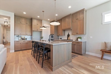 This beautifully designed modern farmhouse backs up to the golf on Falcon Crest Golf Club in Idaho - for sale on GolfHomes.com, golf home, golf lot