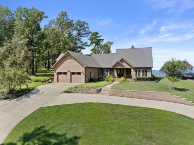 This home on Toledo Bend Lake will keep you on your patio lost on Cypress Bend Golf Resort in Louisiana - for sale on GolfHomes.com, golf home, golf lot