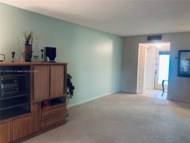Charming and roomy 2 bedroom 2 bath condo with enclosed porch on Oriole Golf and Tennis Club in Florida - for sale on GolfHomes.com, golf home, golf lot