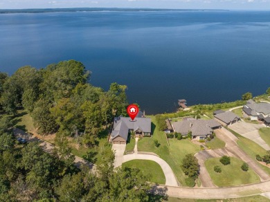 This home on Toledo Bend Lake will keep you on your patio lost on Cypress Bend Golf Resort in Louisiana - for sale on GolfHomes.com, golf home, golf lot