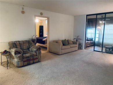 Charming and roomy 2 bedroom 2 bath condo with enclosed porch on Oriole Golf and Tennis Club in Florida - for sale on GolfHomes.com, golf home, golf lot