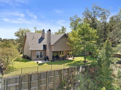 This home on Toledo Bend Lake will keep you on your patio lost on Cypress Bend Golf Resort in Louisiana - for sale on GolfHomes.com, golf home, golf lot