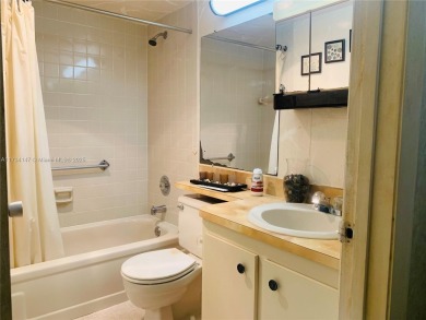 Charming and roomy 2 bedroom 2 bath condo with enclosed porch on Oriole Golf and Tennis Club in Florida - for sale on GolfHomes.com, golf home, golf lot