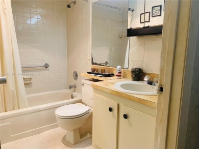 Charming and roomy 2 bedroom 2 bath condo with enclosed porch on Oriole Golf and Tennis Club in Florida - for sale on GolfHomes.com, golf home, golf lot
