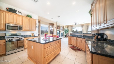 Welcome to this stunner model home on the golf course, boasting on Augusta Ranch Golf Club in Arizona - for sale on GolfHomes.com, golf home, golf lot