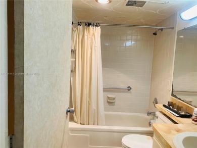 Charming and roomy 2 bedroom 2 bath condo with enclosed porch on Oriole Golf and Tennis Club in Florida - for sale on GolfHomes.com, golf home, golf lot