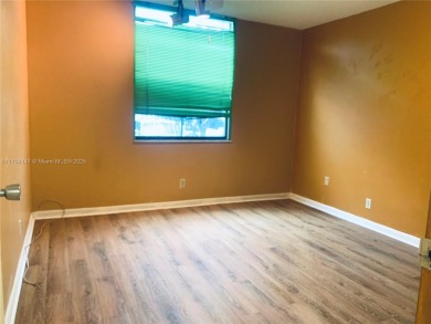 Charming and roomy 2 bedroom 2 bath condo with enclosed porch on Oriole Golf and Tennis Club in Florida - for sale on GolfHomes.com, golf home, golf lot