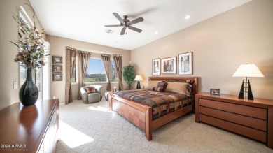 Welcome to this stunner model home on the golf course, boasting on Augusta Ranch Golf Club in Arizona - for sale on GolfHomes.com, golf home, golf lot