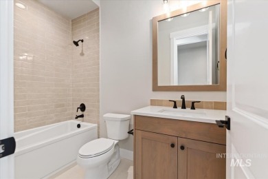 This beautifully designed modern farmhouse backs up to the golf on Falcon Crest Golf Club in Idaho - for sale on GolfHomes.com, golf home, golf lot