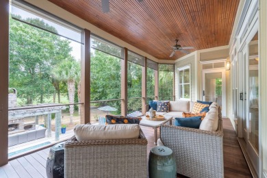 As you step into this elegant home, you'll be greeted by a on Dunes West Golf Club in South Carolina - for sale on GolfHomes.com, golf home, golf lot