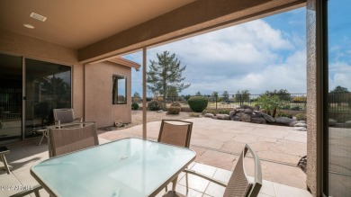 Welcome to this stunner model home on the golf course, boasting on Augusta Ranch Golf Club in Arizona - for sale on GolfHomes.com, golf home, golf lot