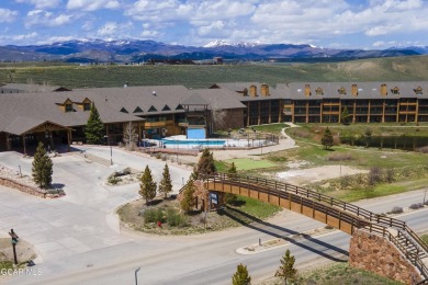 This unique studio condo, complete with an adjacent lock-off on Headwaters Golf Course At Granby Ranch in Colorado - for sale on GolfHomes.com, golf home, golf lot