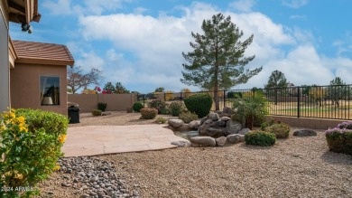 Welcome to this stunner model home on the golf course, boasting on Augusta Ranch Golf Club in Arizona - for sale on GolfHomes.com, golf home, golf lot