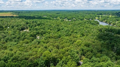 Imagine building your getaway in a quiet, wooded setting just on Lake Tansi Village Country Club in Tennessee - for sale on GolfHomes.com, golf home, golf lot