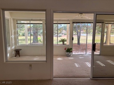 From the front courtyd entry to the views accessible from inside on Highland Falls Golf Club in Nevada - for sale on GolfHomes.com, golf home, golf lot