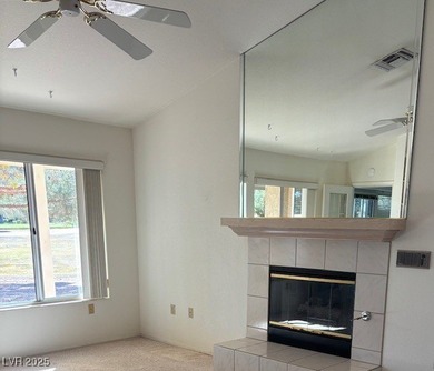 From the front courtyd entry to the views accessible from inside on Highland Falls Golf Club in Nevada - for sale on GolfHomes.com, golf home, golf lot