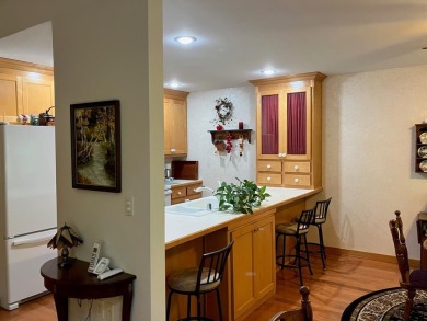 Condo living at its best with easy access to all that Door on Cherry Hills Golf Course in Wisconsin - for sale on GolfHomes.com, golf home, golf lot