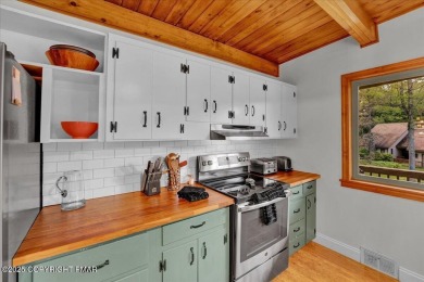 Step into this 3-bedroom, 2-bath Lake Harmony home showcasing on Split Rock Resort and Country Club in Pennsylvania - for sale on GolfHomes.com, golf home, golf lot