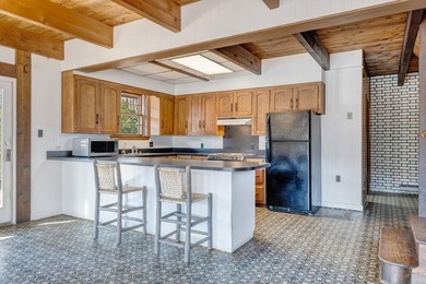 Million-dollar lake and mountain views define this on Waters Edge Country Club in Virginia - for sale on GolfHomes.com, golf home, golf lot