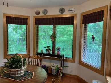 Condo living at its best with easy access to all that Door on Cherry Hills Golf Course in Wisconsin - for sale on GolfHomes.com, golf home, golf lot