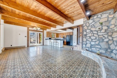 Million-dollar lake and mountain views define this on Waters Edge Country Club in Virginia - for sale on GolfHomes.com, golf home, golf lot