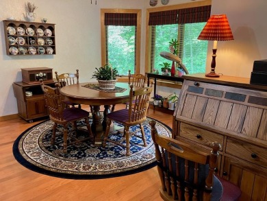 Condo living at its best with easy access to all that Door on Cherry Hills Golf Course in Wisconsin - for sale on GolfHomes.com, golf home, golf lot