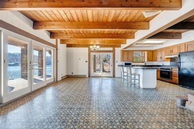 Million-dollar lake and mountain views define this on Waters Edge Country Club in Virginia - for sale on GolfHomes.com, golf home, golf lot