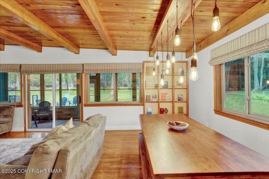 Step into this 3-bedroom, 2-bath Lake Harmony home showcasing on Split Rock Resort and Country Club in Pennsylvania - for sale on GolfHomes.com, golf home, golf lot