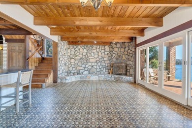 Million-dollar lake and mountain views define this on Waters Edge Country Club in Virginia - for sale on GolfHomes.com, golf home, golf lot