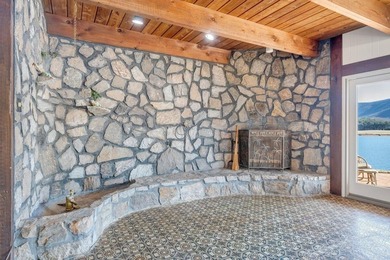 Million-dollar lake and mountain views define this on Waters Edge Country Club in Virginia - for sale on GolfHomes.com, golf home, golf lot