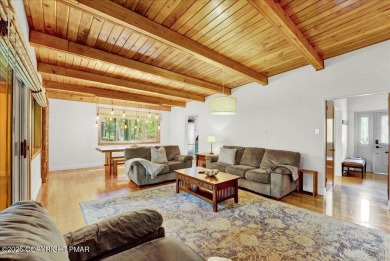 Step into this 3-bedroom, 2-bath Lake Harmony home showcasing on Split Rock Resort and Country Club in Pennsylvania - for sale on GolfHomes.com, golf home, golf lot