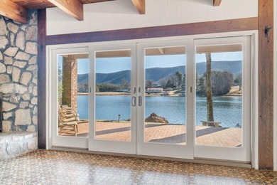 Million-dollar lake and mountain views define this on Waters Edge Country Club in Virginia - for sale on GolfHomes.com, golf home, golf lot