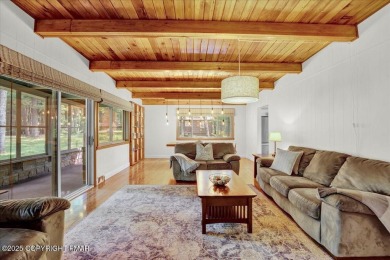 Step into this 3-bedroom, 2-bath Lake Harmony home showcasing on Split Rock Resort and Country Club in Pennsylvania - for sale on GolfHomes.com, golf home, golf lot