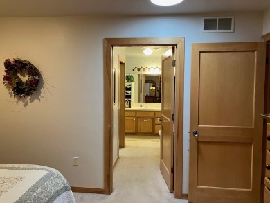Condo living at its best with easy access to all that Door on Cherry Hills Golf Course in Wisconsin - for sale on GolfHomes.com, golf home, golf lot