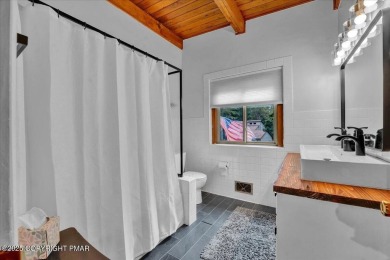 Step into this 3-bedroom, 2-bath Lake Harmony home showcasing on Split Rock Resort and Country Club in Pennsylvania - for sale on GolfHomes.com, golf home, golf lot