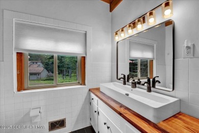 Step into this 3-bedroom, 2-bath Lake Harmony home showcasing on Split Rock Resort and Country Club in Pennsylvania - for sale on GolfHomes.com, golf home, golf lot