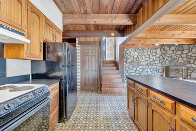 Million-dollar lake and mountain views define this on Waters Edge Country Club in Virginia - for sale on GolfHomes.com, golf home, golf lot