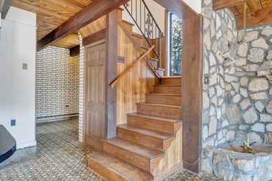 Million-dollar lake and mountain views define this on Waters Edge Country Club in Virginia - for sale on GolfHomes.com, golf home, golf lot