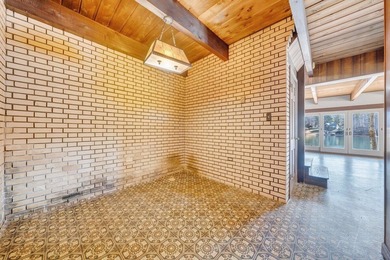 Million-dollar lake and mountain views define this on Waters Edge Country Club in Virginia - for sale on GolfHomes.com, golf home, golf lot