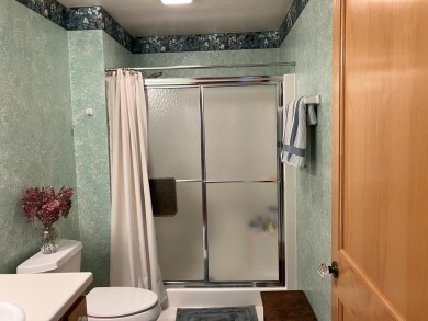 Condo living at its best with easy access to all that Door on Cherry Hills Golf Course in Wisconsin - for sale on GolfHomes.com, golf home, golf lot